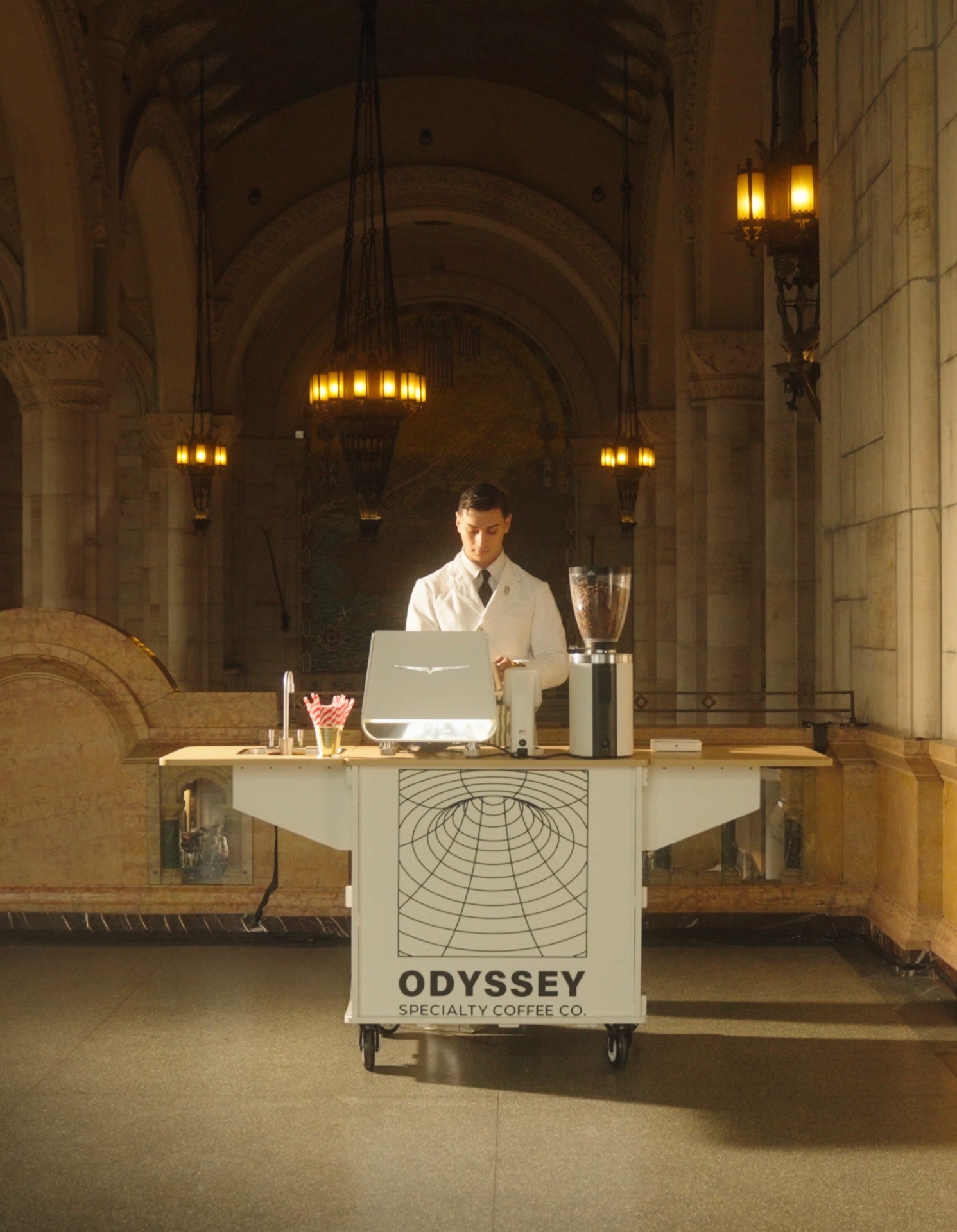 Angelo serving from the Odyssey cart in a grand hall