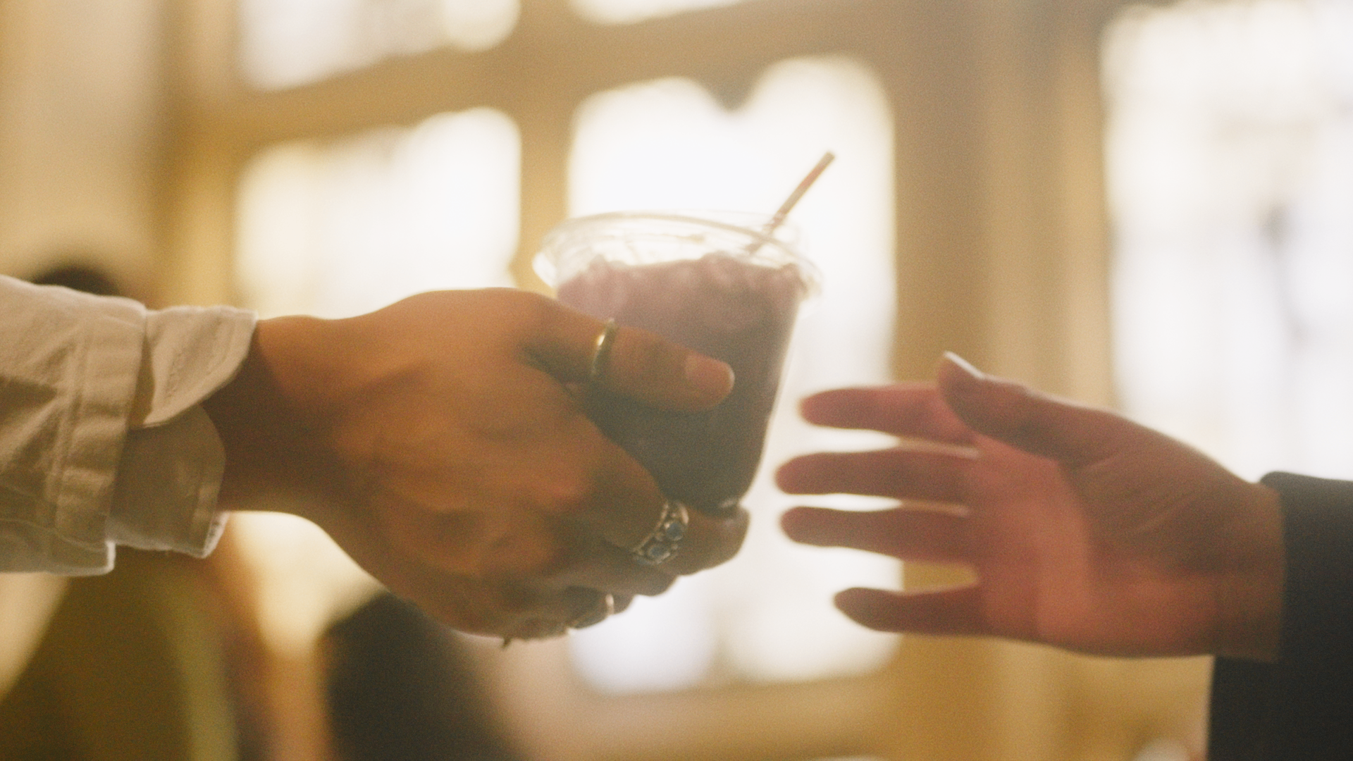 Handing off a drink to a guest